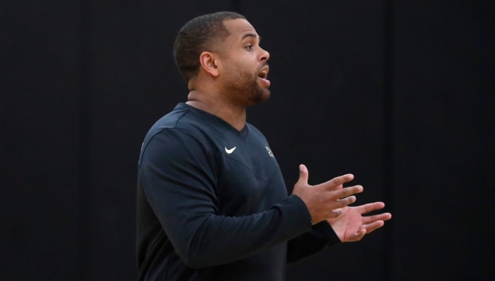 Thompson leads a drill during a 2023 practice in his role as director of player development.